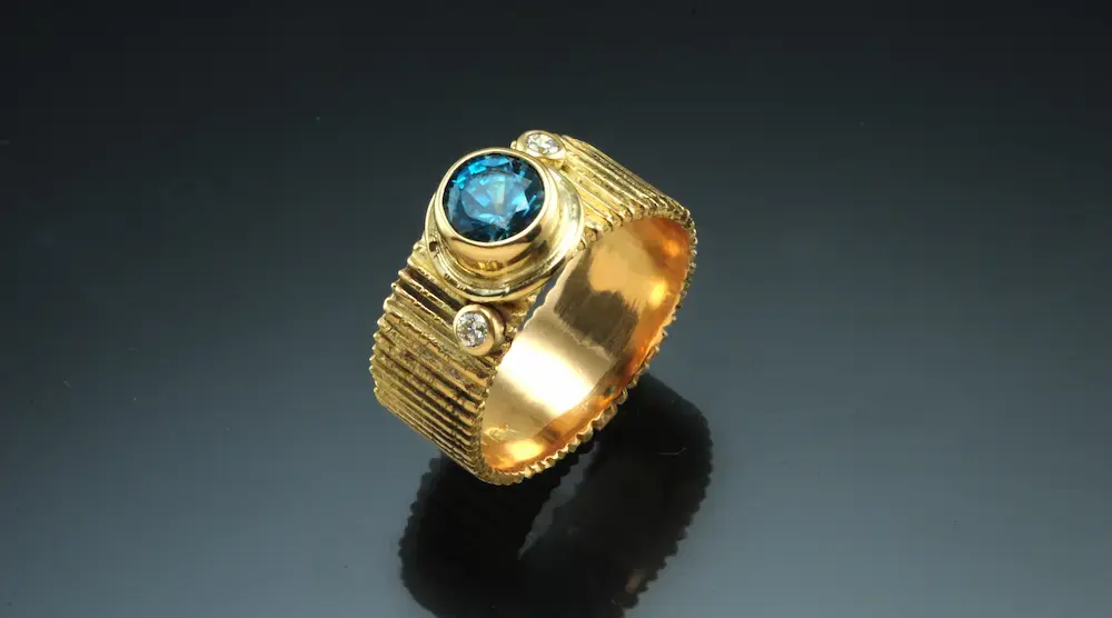 Riga ring with blue zircon and diamond